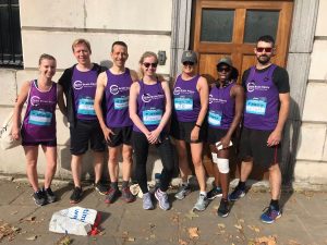 Jo Chapman and Melanie Whittaker sporting Bolt Burdon Kemp caps, with the other CBIT runners