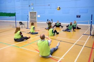 Bolt Burdon Kemp teams playing sitting volleyball