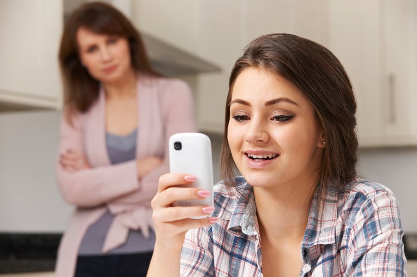 Mother Concerned About Teen Daughter's Use Of Mobile Phone