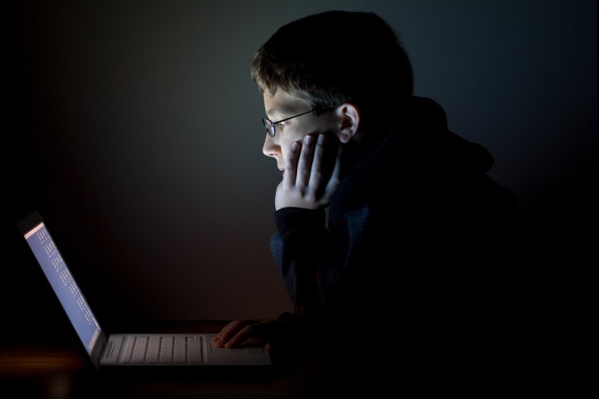 Teen-Boy-with-Laptop-In-the-Dark