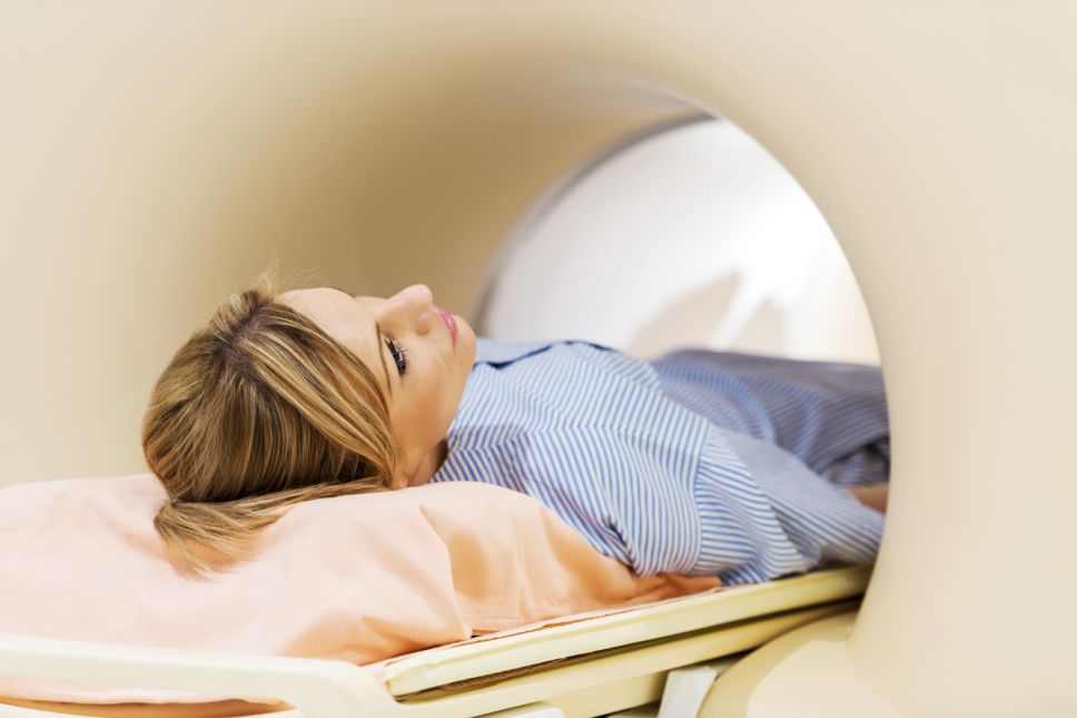 Woman receiving a MRI Scan.