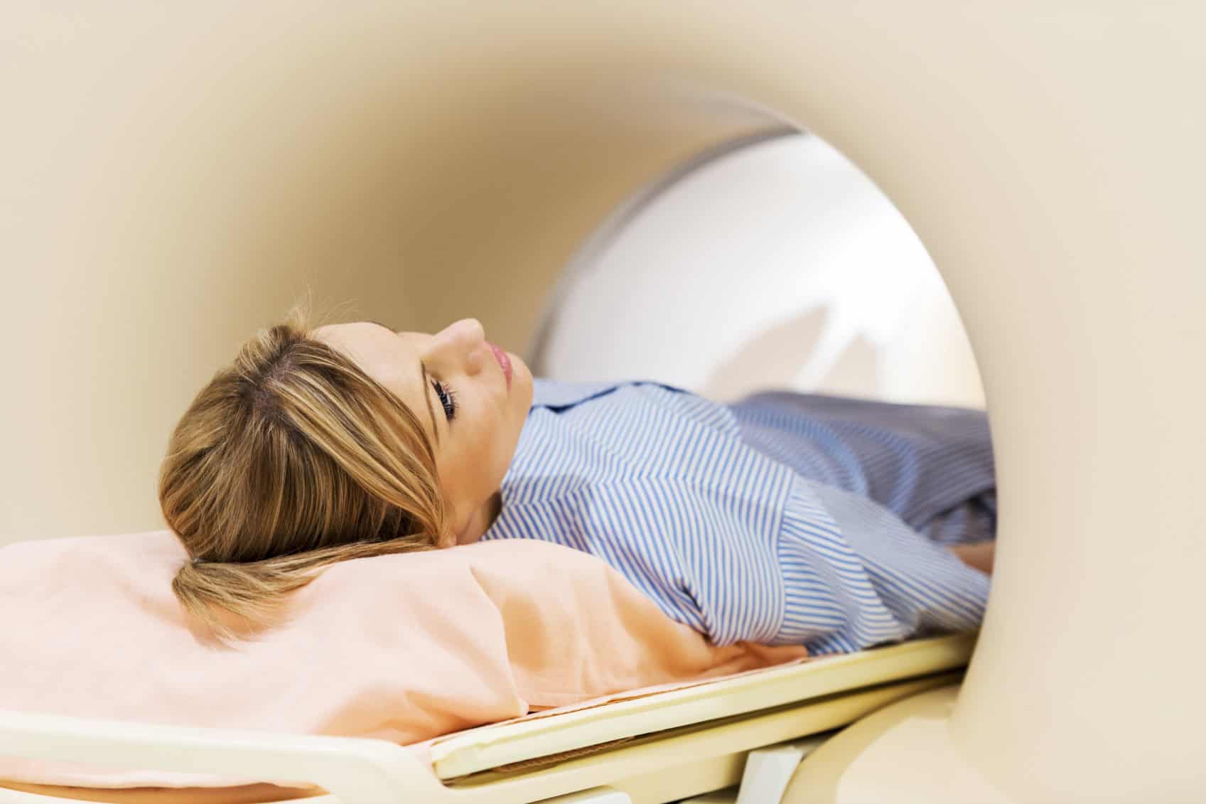 Woman receiving a MRI Scan.