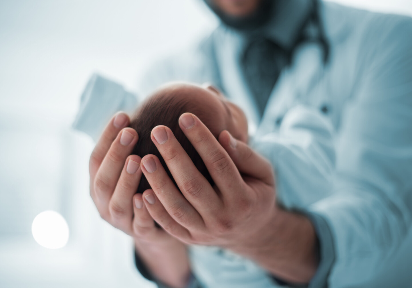 Pediatrician,Holding,A,Beautiful,Newborn,Baby,Boy